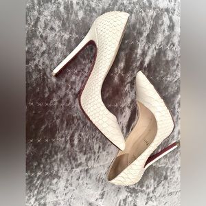 SOLD****RARE** previously loved Christian Louboutin Python heels*****